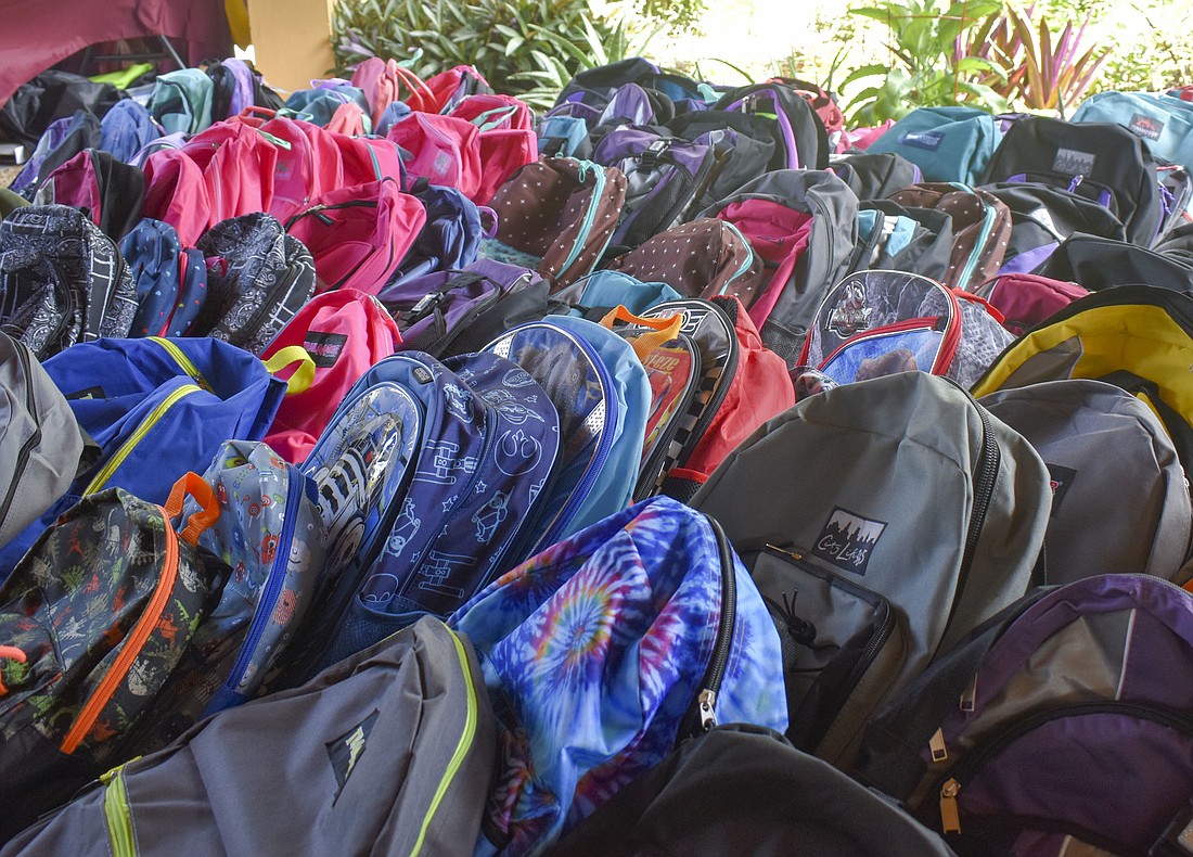 Volunteers packed 250 backpacks with school supplies during the Pack the Patrol Car fundraiser in August 2019 to hand out to Sarasota students.