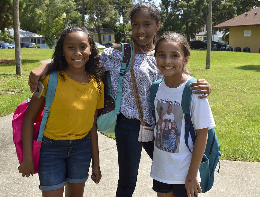 Nyla Mendoza, 10, Silviana Mendoza, 11, and Amelia Adkins, 9