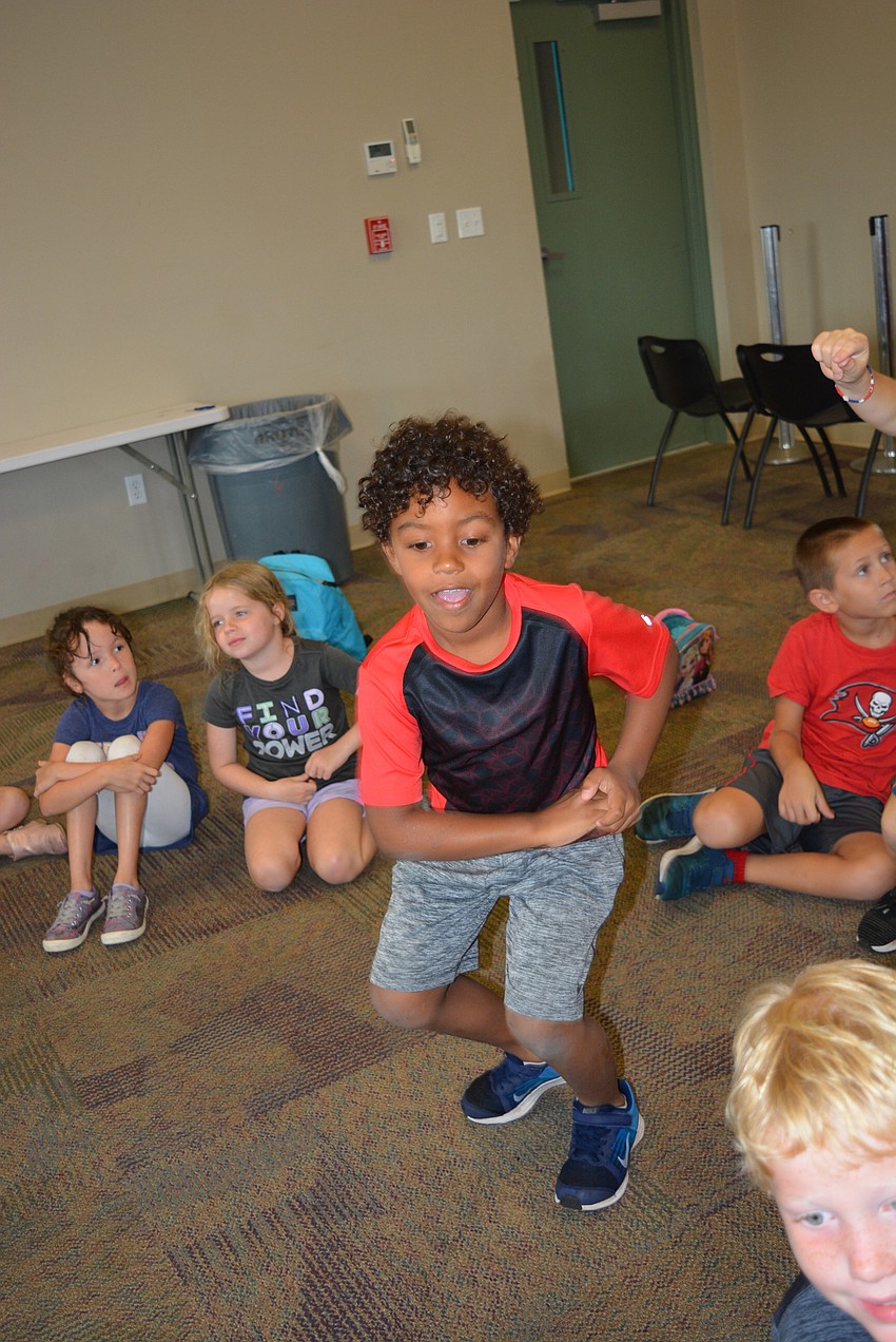 Gilbert W. McNeal Elementary second-grader Pierce Williams competes in a dance-off to 