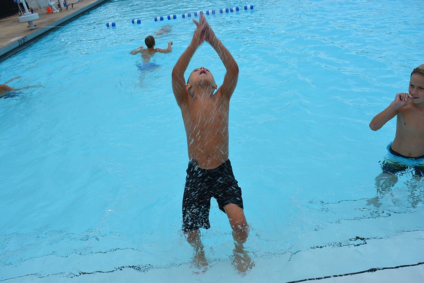 Gullett Elementary School fifth-grader Michael Smolka shows off his back flipping skills.