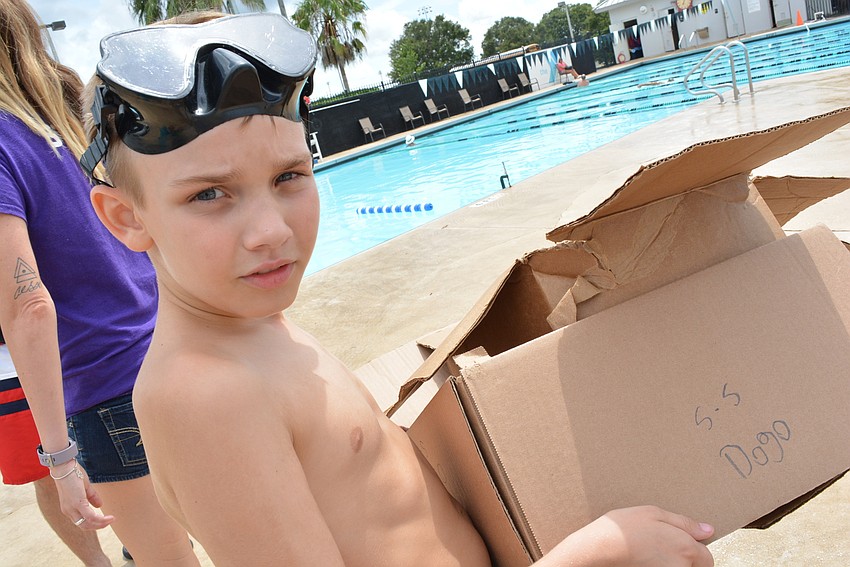 Dalton Burnham, 10, thinks his boat, called the S.S. Dogo,  will sink — and he was right.