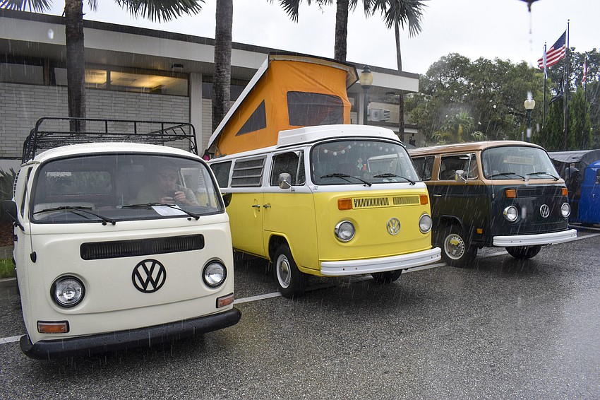 Vintage Volkswagen vans are lined up prepared to be judged.