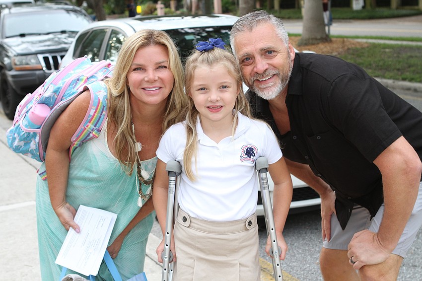 Katie, Harper and Corey Jordan walk together to Southside Elementary. // Harry Sayer