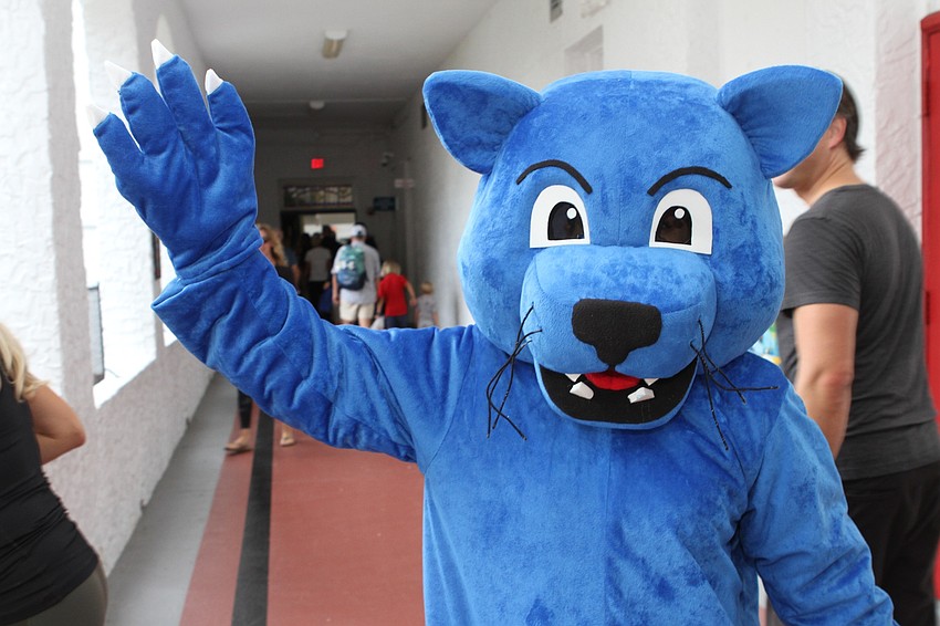 Southside’s Panther Mascot welcomes children to their first day of the new school year. // Harry Sayer