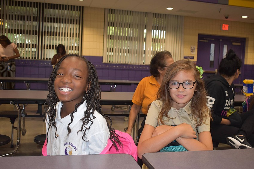Imori Gordon and Stella Nash await the first day of third grade at Emma E. Booker Elementary. // Nathalie Kaemmerer