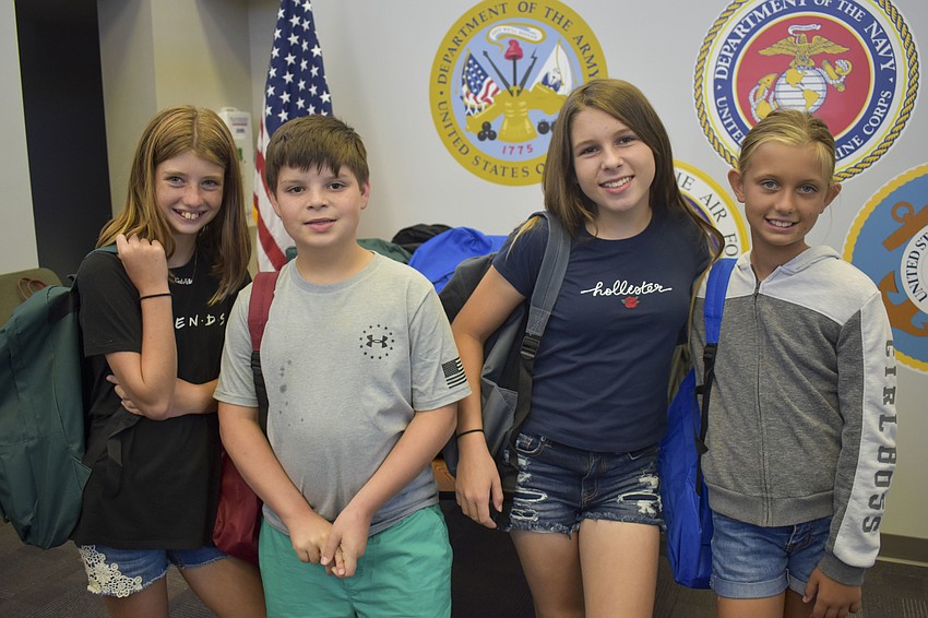 Gabi Landis, 12,  Xavier Hughes, 10, Bailey Hughes, 13,  and Izzie Landis, 10