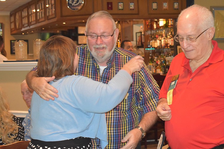 Morgan Gerhart and Jack Dean greet each other like old friends.