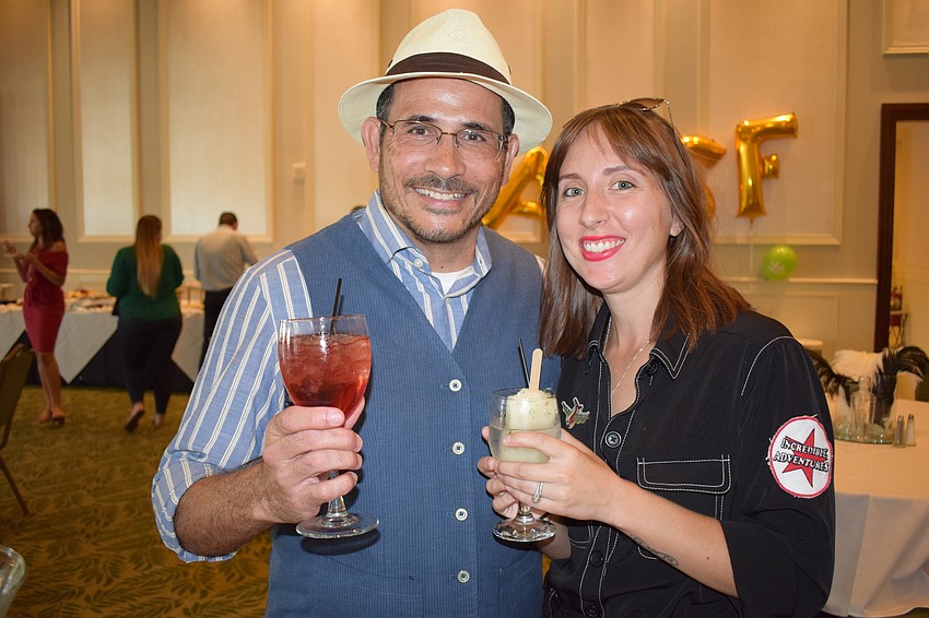 Realtor Greg Claxton and Rebecca Claxton of Incredible Adventures served as guest bartenders.