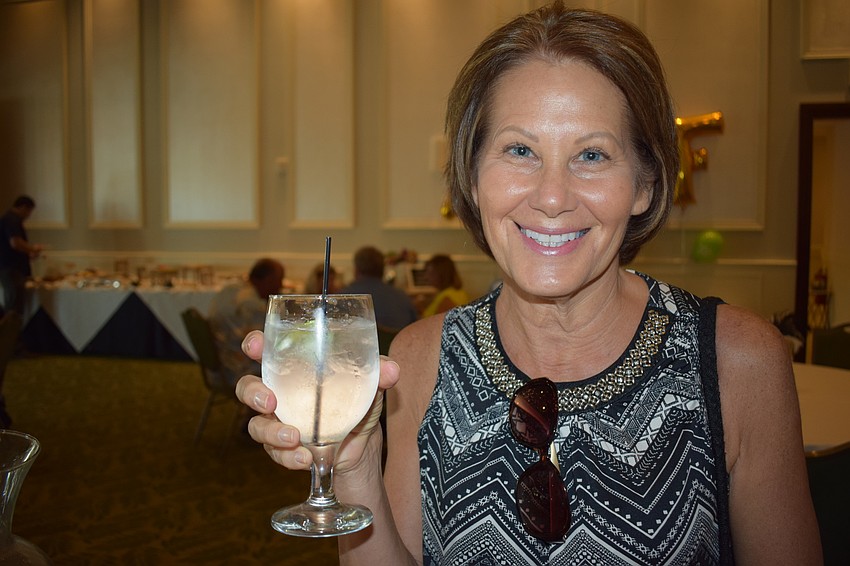 Wagner Reality's Diane Lee enjoys a cocktail and supports ALS research in the process.