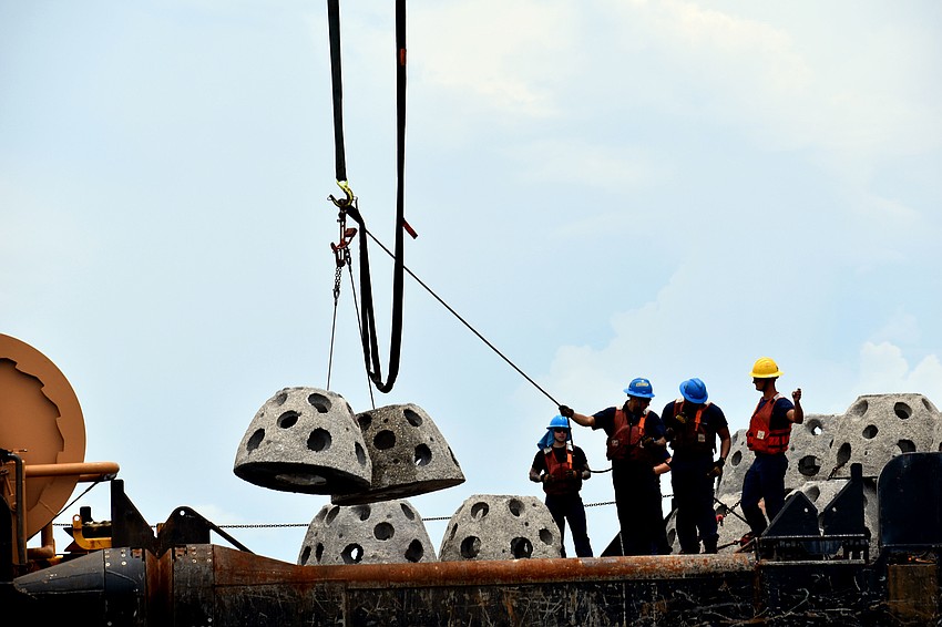 The reef balls are placed two at a time.