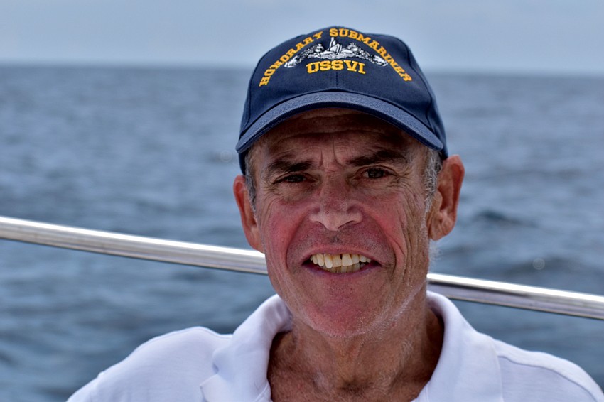 Eternal Reefs CEO George Frankel can't help but smile as he watches the memorial be put in place.