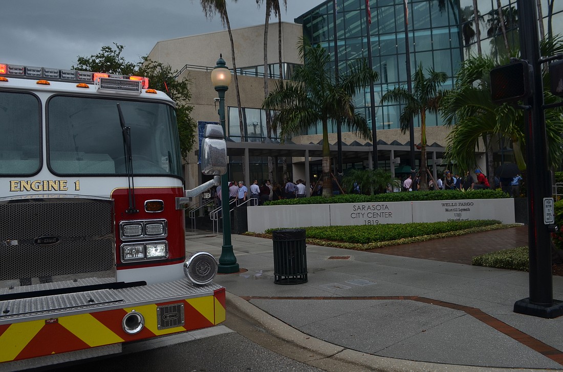 People evacuated from the building said an alarm went off after a loud lightning strike.