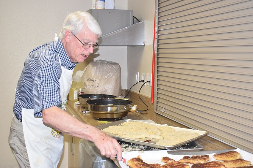 George Rauch runs the fryer.
