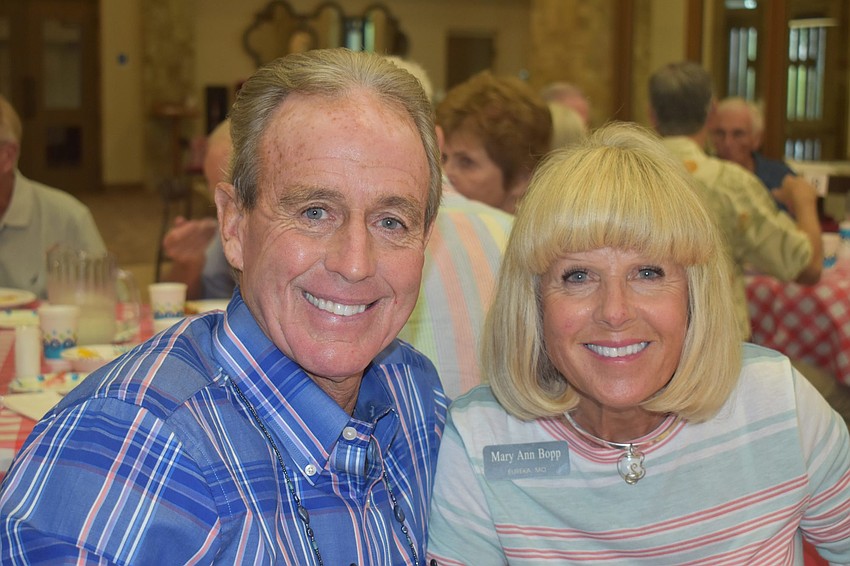 Kirt and Mary Ann Bopp sit next to each other to eat.