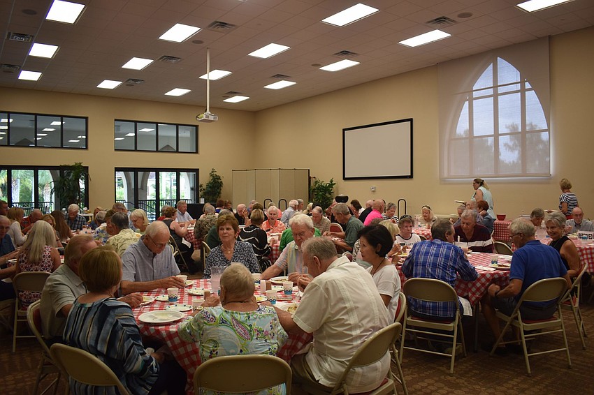 The room felt full with the chatter and friendship of members of the congregation.