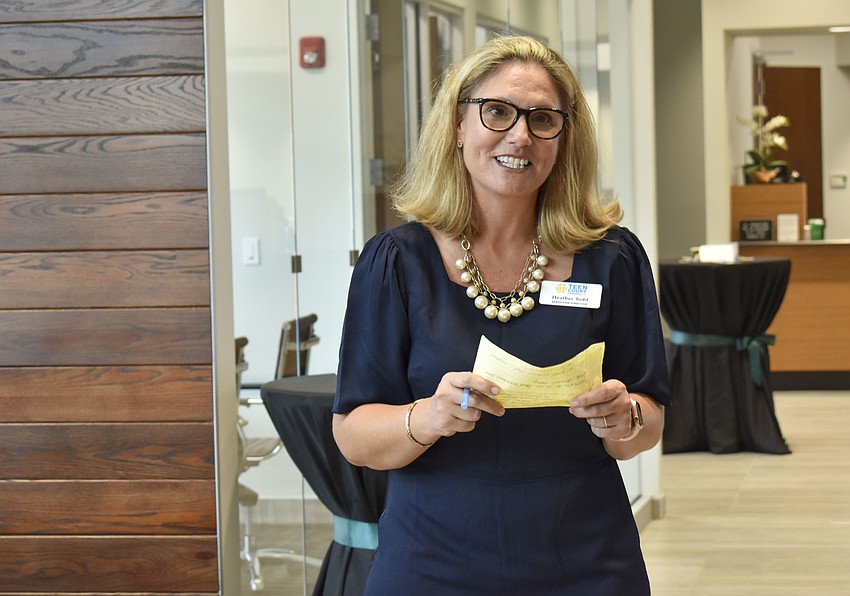 Heather Todd, executive director of Teen Court, tells the crowd a little about what Teen Court does.