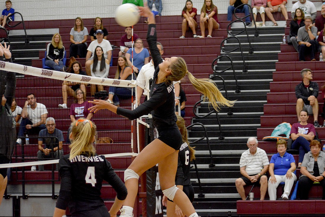 Madison Binkley, an FSU beach volleyball commit, records a kill against Lakewood Ranch.