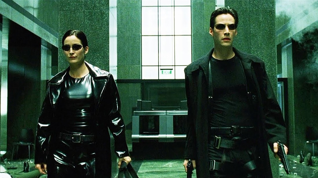 Carrie-Ann Moss and Keanu Reeves in "The Matrix." Photo source: Vudu.