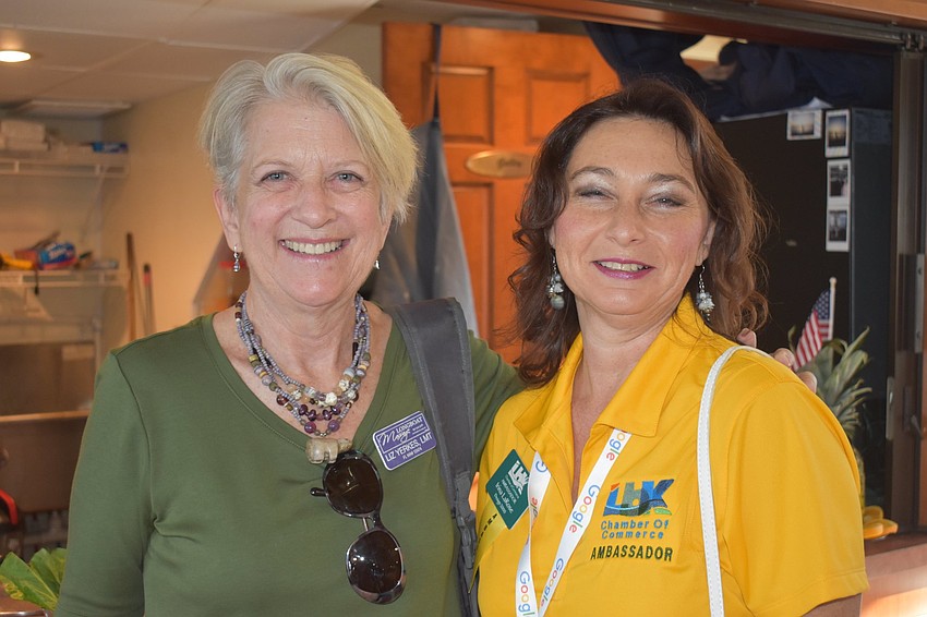 Liz Yerkes and Irina LaRose pose for a photo.