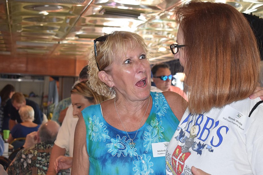 Melinda Bradway greets Wende Webb.