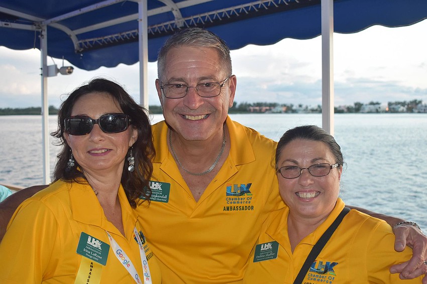 Irina LaRose, Scott Kuykendall and Debbie Shaffer pose on the upper deck.