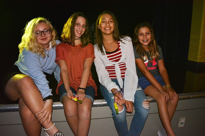 Alexis Routa, Addison Schoenfeld, Kali Schmick and Brooke Decillis take a rest from dancing.