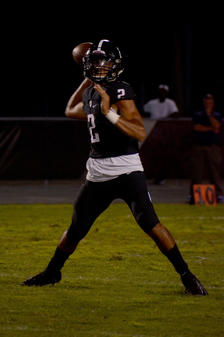 Braden River High junior quarterback Shawqi Itraish fires downfield.