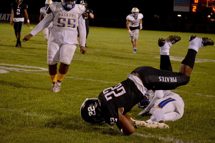 Braden River running back Lavontae Youmans flips over a Largo defender.