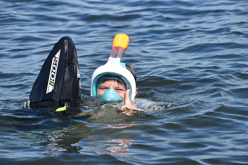 Tripp Lorentz zooms around on a sea scooter.