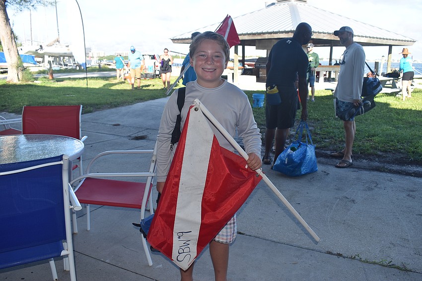 Tripp Lorentz shows off the dive flags.