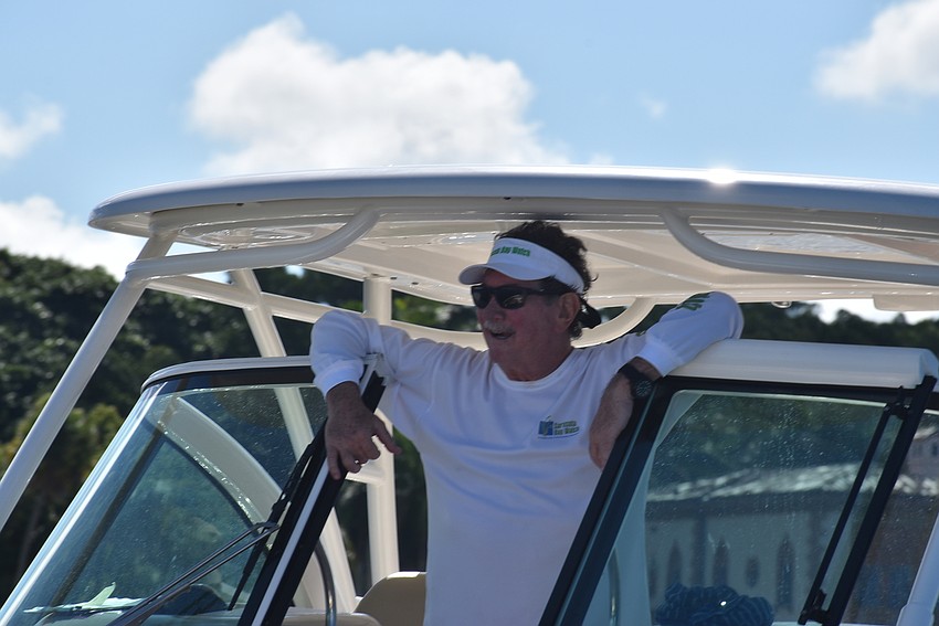 Captain Steve Martin watches his citizen scientists.