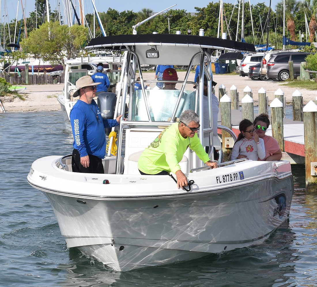 A boat heads off into Sarasota Bay as part of the Seagrass Survey. Eric Garwood
