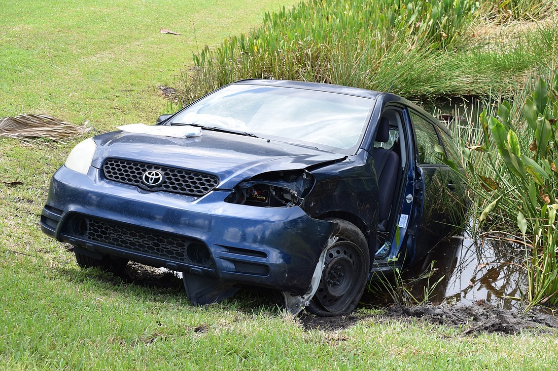 A car was left partially in a lake at the intersection of Natures Way and Lakewood Ranch Boulevard after a single-vehicle crash.
