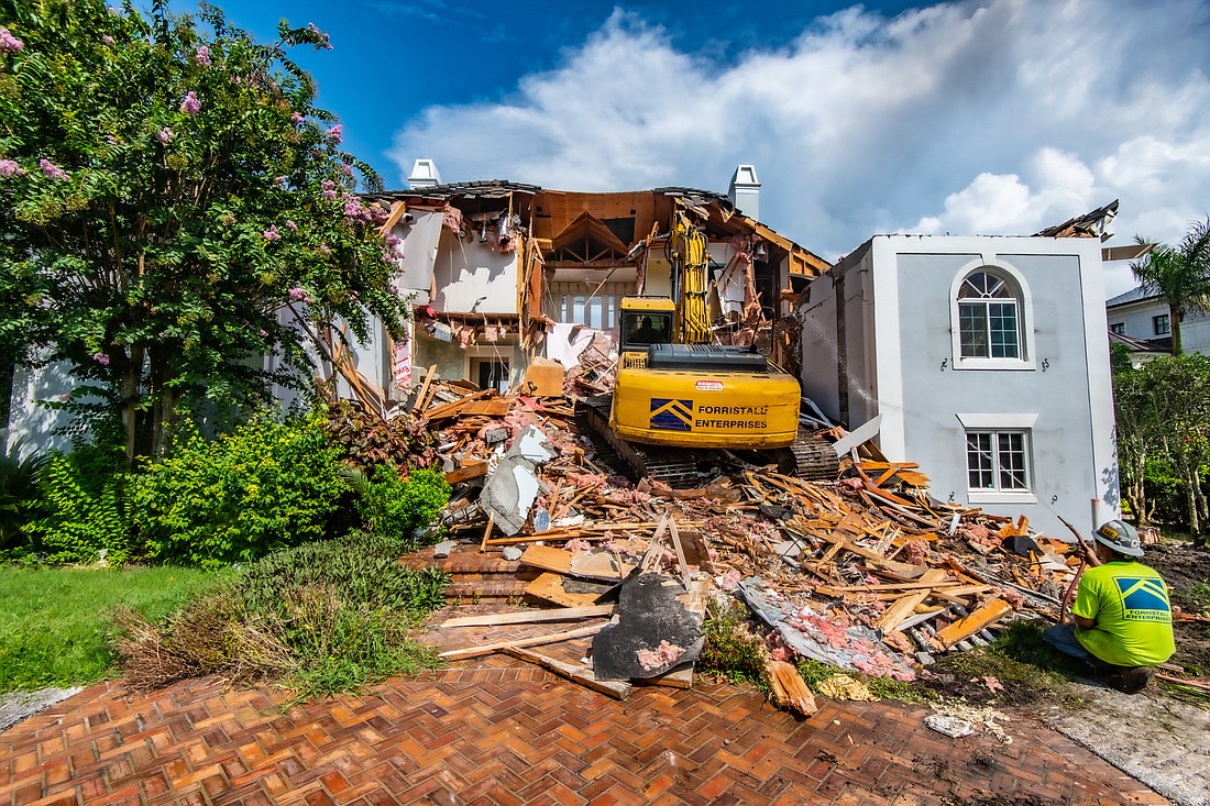 Perrone Construction began demolishing the home at 1233 Hillview Drive earlier this month. Photo courtesy Perrone Construction