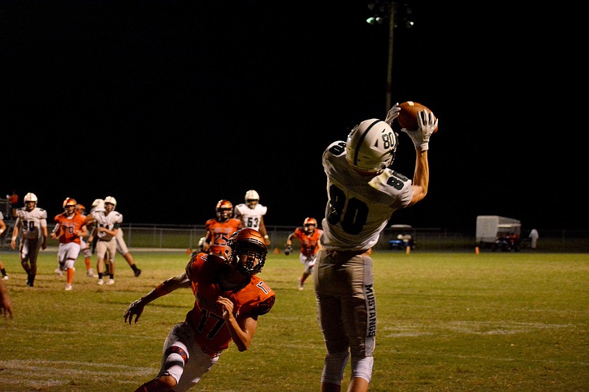 Lakewood Ranch senior Michael Cucci makes a catch along the sideline. Cucci had two touchdown catches against Lemon Bay.