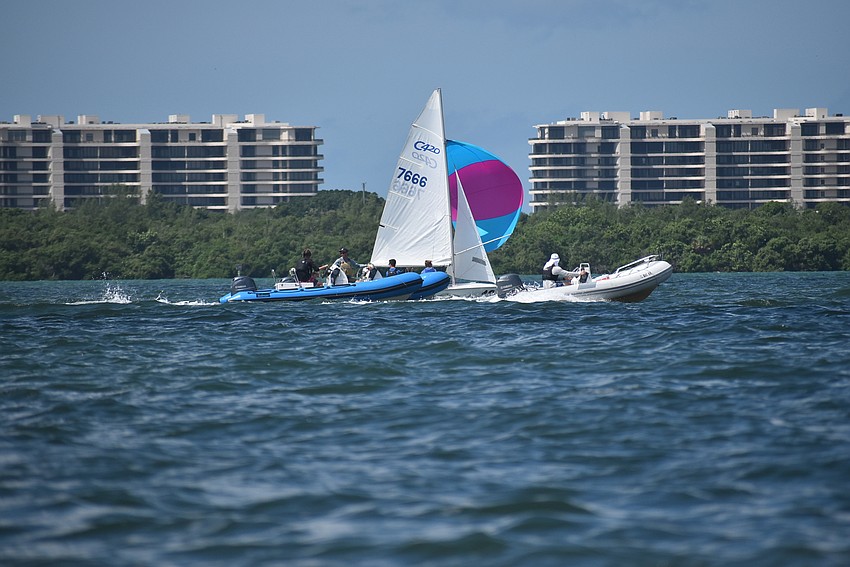 A spinnaker is let loose.