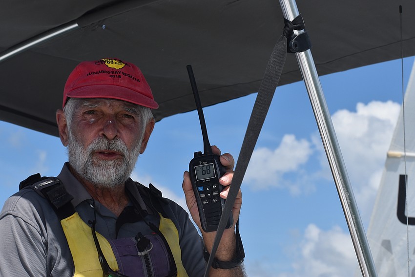 Jim Zellmer tests the radio.