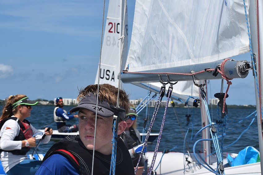 Cooper Delbridge on his boat.