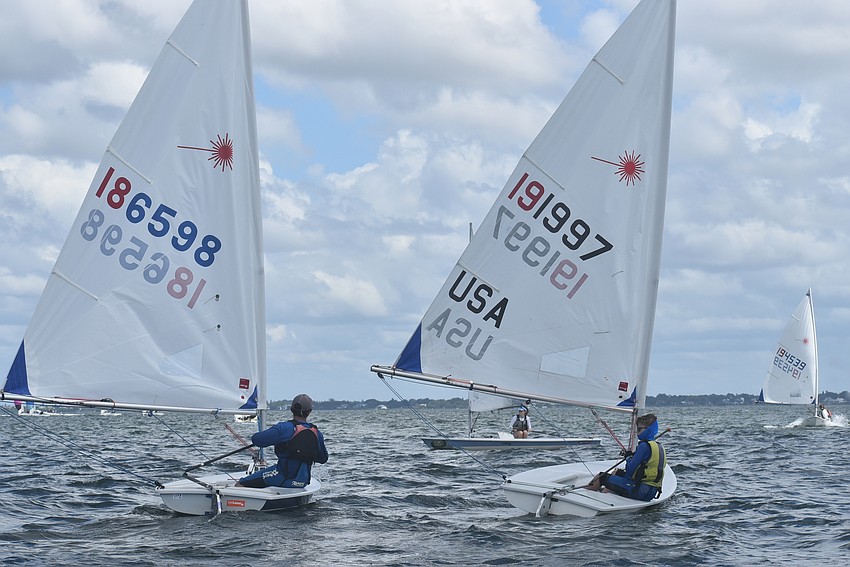 Two boats sit and wait.