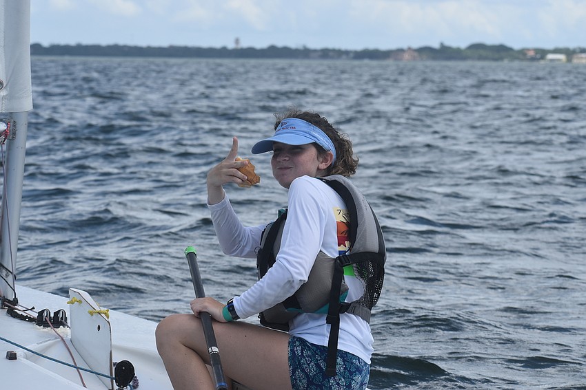 Ava Edinger fuels up with a sandwich before her race.