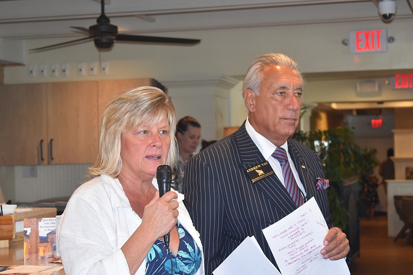 Tamera Jackson and Andrew Vac address the crowd.