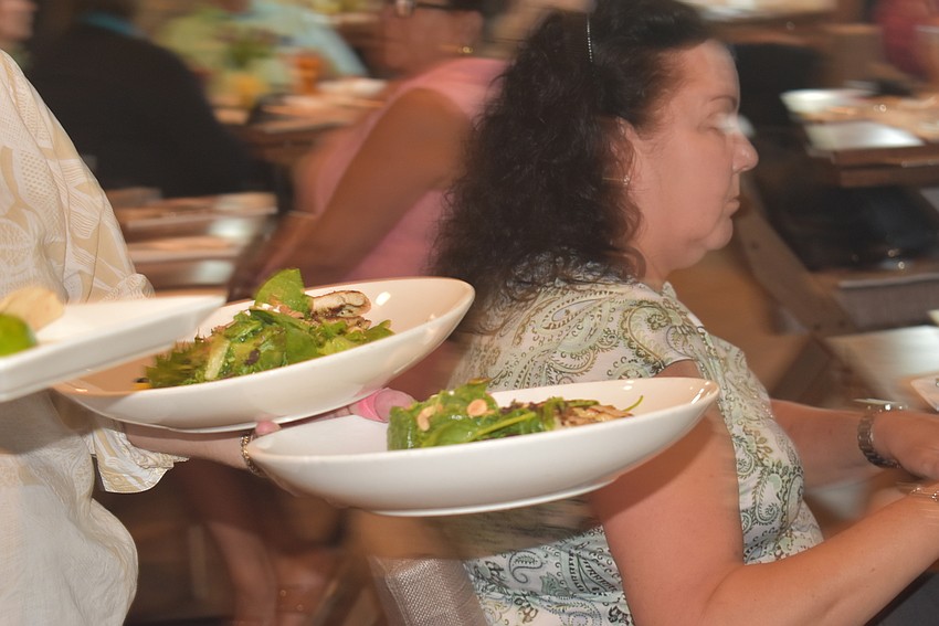 Food whizzed past to get to hungry attendees.