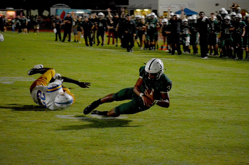Lakewood Ranch junior running back Isaiah Harrison dives into the end zone for a touchdown.