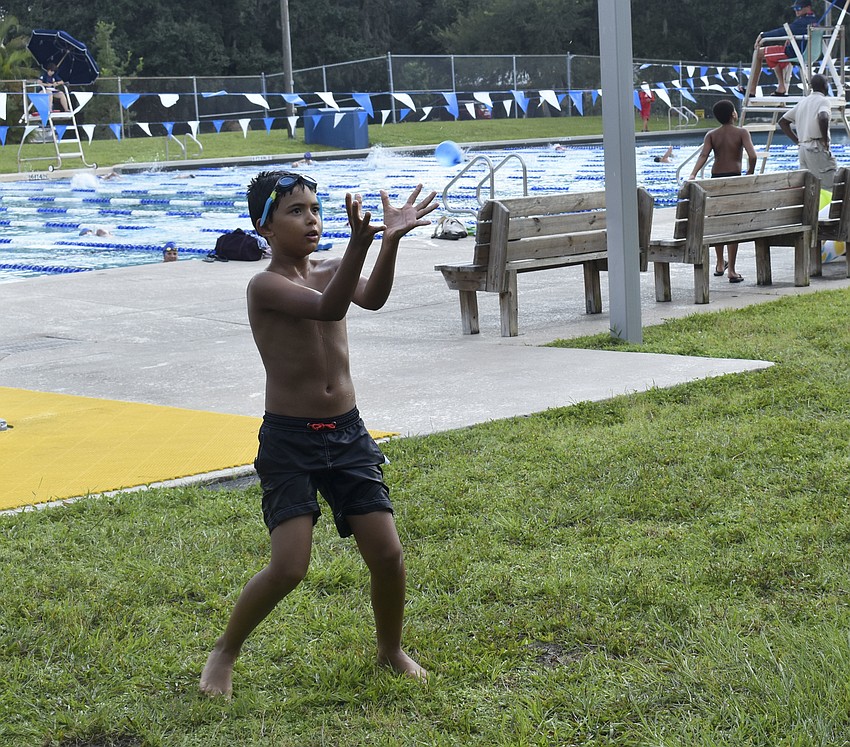 Aerien Goveia catches his water balloon.