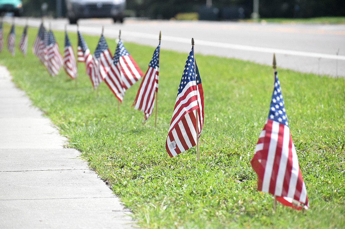 Longboat Key&#39;s Sept. 11 memorial consists of 2,977 flags arrayed along Gulf of Mexico Drive.