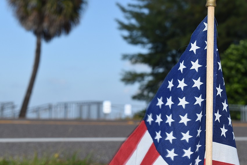 The Stars and Stripes near the beach.