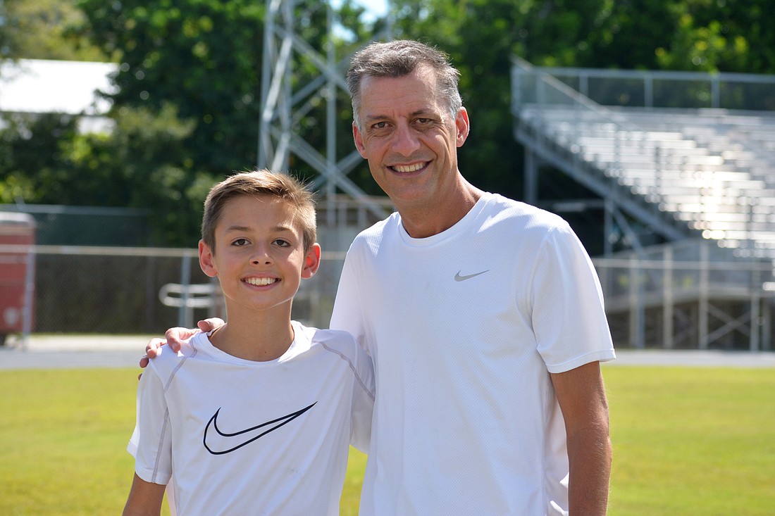 Brendan and Jay Roper are a freshman and cross country coach at Riverview High.