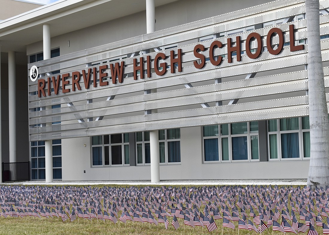 2,977 flags were set up on the front lawn of Riverview High on Wednesday morning.