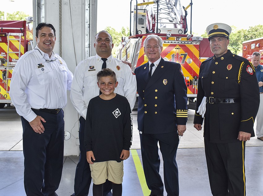 Dominic Mattera, 9, stands with Michael Rodrigue, James Mattera, William Costello and Dan Rankin