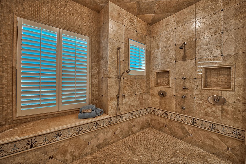The shower in the master bath has room for the homeowners ... and the Green Bay Packers.